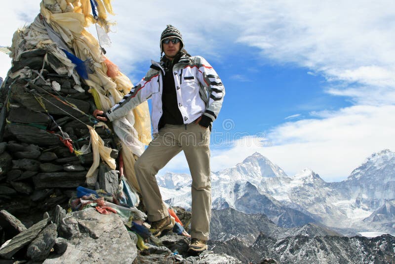 Climber standing on the top of Kongma La pass stock photo