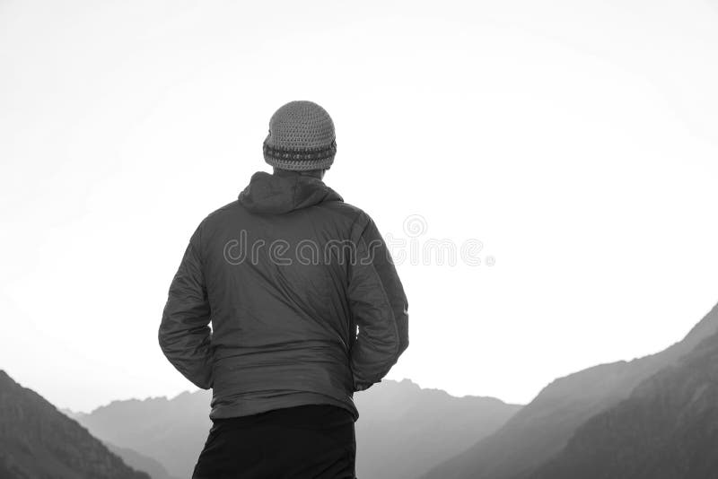 Climbers enjoy the tranquility in the mountains stock image Climbers enjoy the tranquility in the mountains stock image