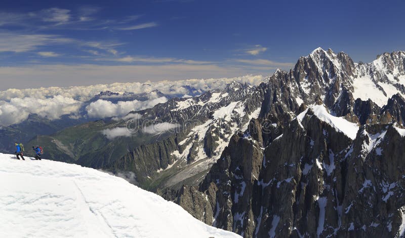 Climbers on French Alps Mountains near Aiguille du Midi, France, Europe