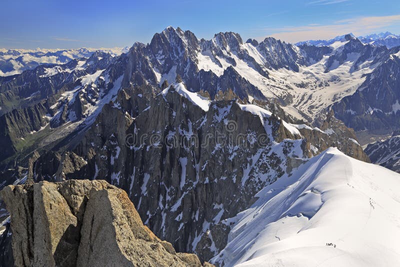 Climbers on French Alps Mountains near Aiguille du Midi, France, Europe