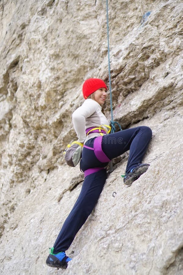 Climbing girl in the rocks editorial image. Image of climber 103580980