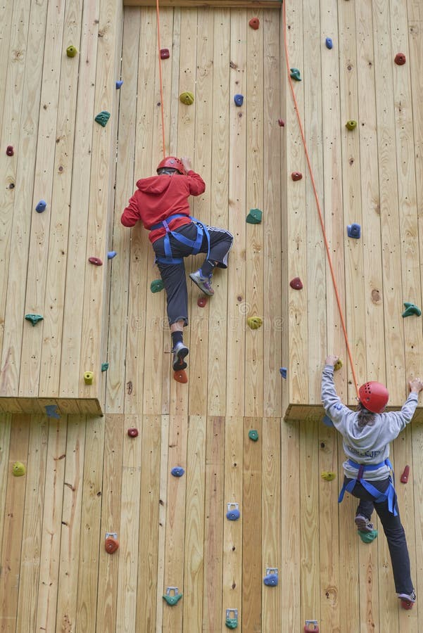 Climbing Wall Challenge editorial stock photo. Image of high 142435108