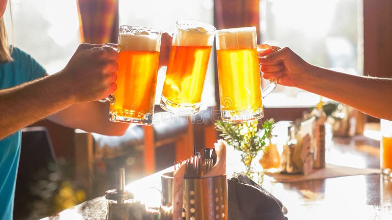 Clinking with Friends using Beer Glass stock photos Clinking with Friends using Beer Glass stock photos
