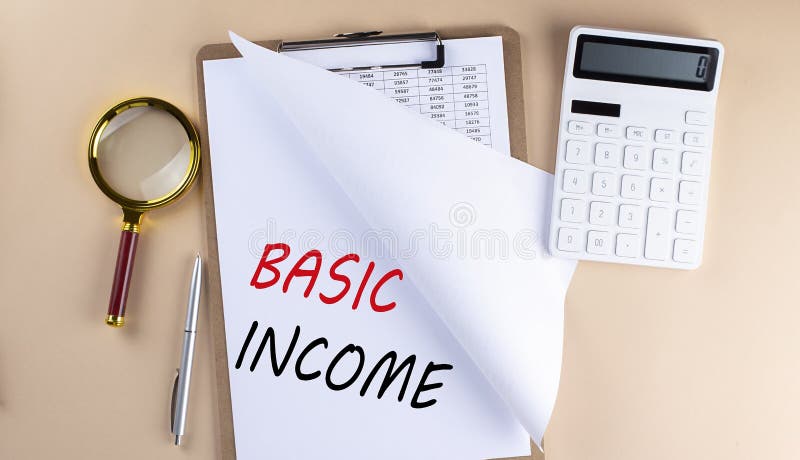 Clipboard with chart and text BASIC INCOME with magnifier ,calculator on beige background stock photography
