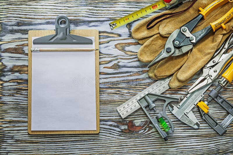 Clipboard Construction Tools on Wooden Board Top View Stock Image
