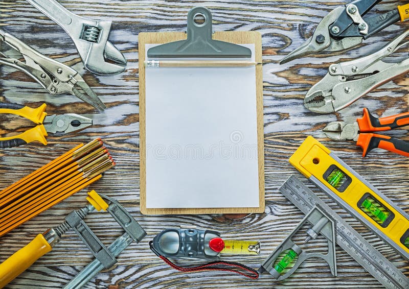 Clipboard Construction Tools on Wooden Board Top View Stock Image