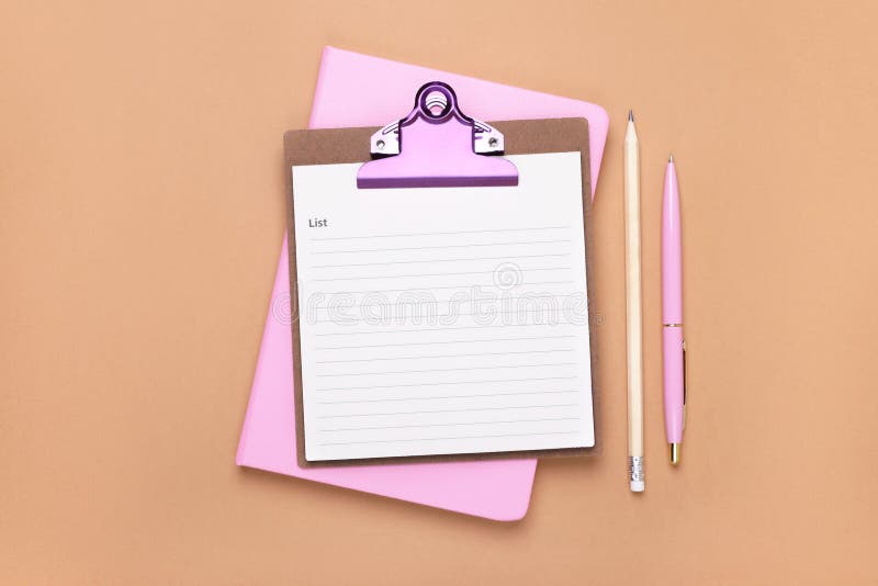 Clipboard with to do notes, planner, pen and pencil on brown background, flat lay. Space for text royalty free stock images