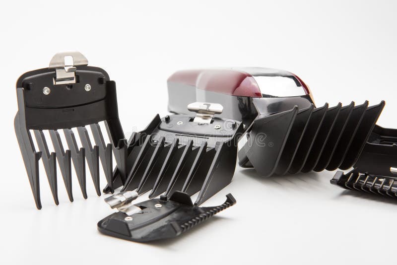 Clippers and Accessories for Cutting Hair on a White Background Stock