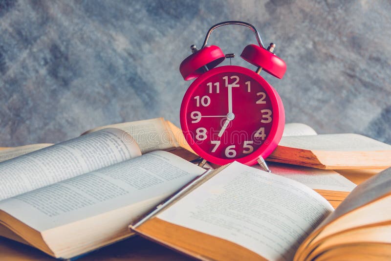 Clock and book stock image. Image of page, antique, hardcover 88686083