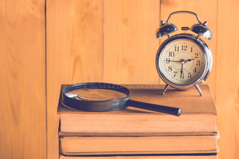 Clock and book stock image. Image of page, bookworm, pages 88686151