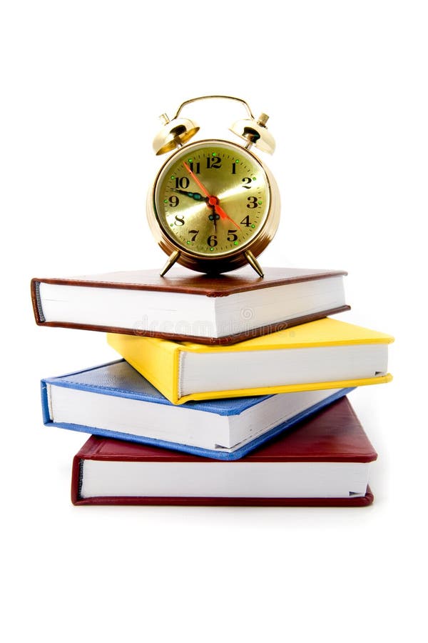 Clock and books stock photo. Image of watch, education 19151990