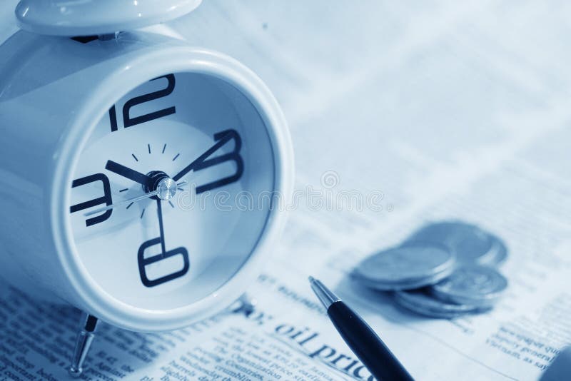 Red clock and newspaper stock image. Image of business 12321543