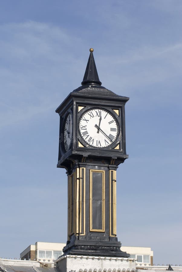 Clock on Pier at Brighton. England Stock Photo Image of clock, face