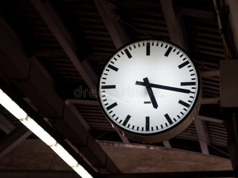 Clock in railway station stock photo. Image of business 103214136