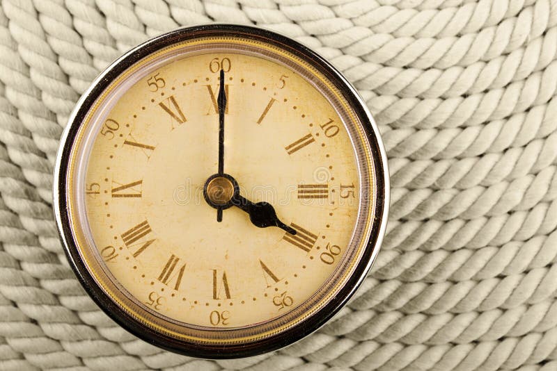 Clock with Roman numerals. Time four hours. stock photo