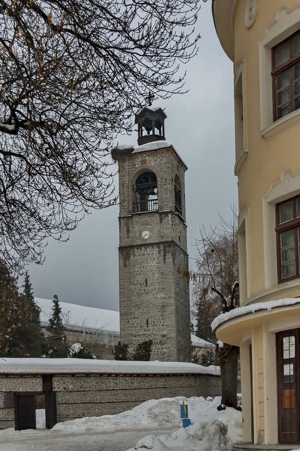 Clock tower at church in Bansko town stock image Clock tower at church in Bansko town stock image