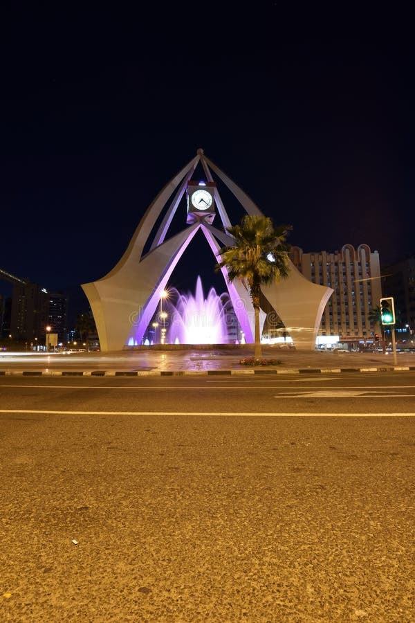 Clock tower dubai at night editorial stock image. Image of autos
