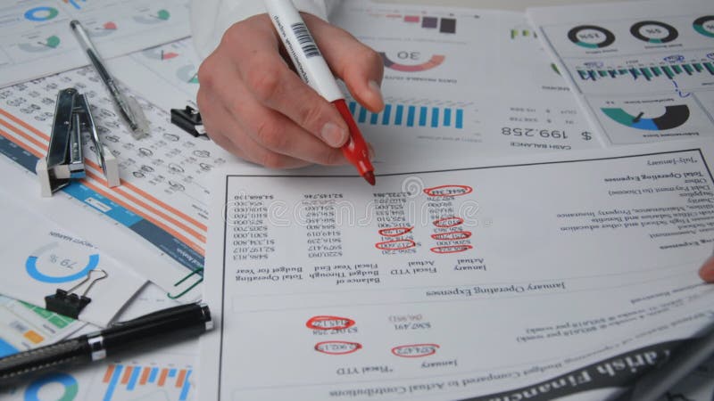 Close hand of the boss and red marker financial report stock video footage