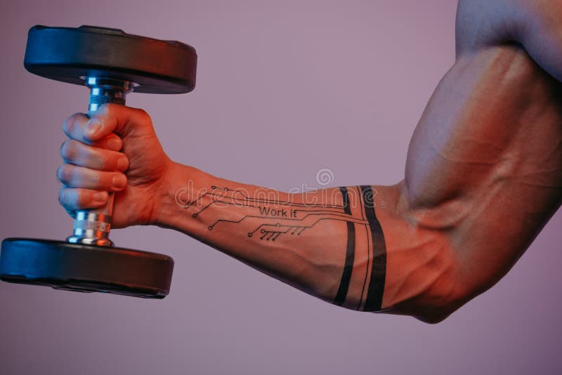 close photo muscular arm which doing bicep curls under blue red lights dumbbell forearm man tattoo work 204353803