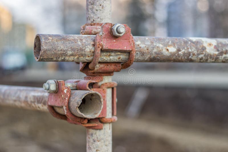 Close of rusty metal scaffolding connector royalty free stock photos