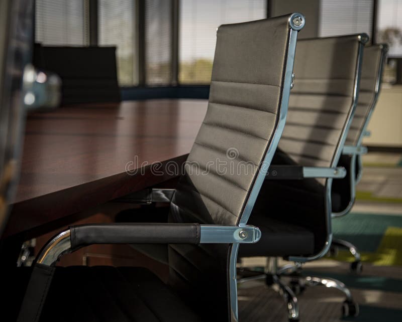Close Uo of Modern Office Chairs at a Conference Room Table Stock Image