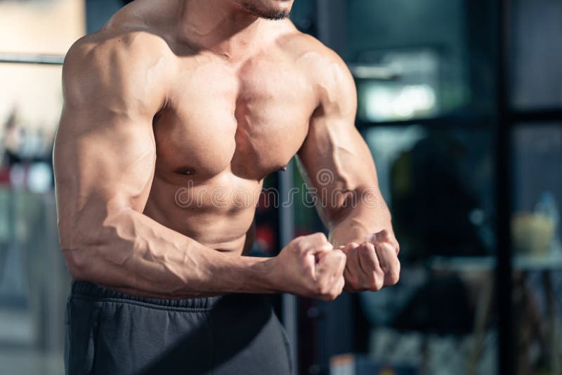 Close-up of Active Healthy Sport Male or Athlete Showing Muscles and ...