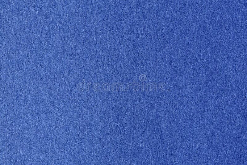 Close up aka macro shot of blue construction paper.