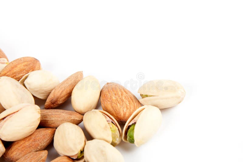Close-up almonds and pistachios royalty free stock photography