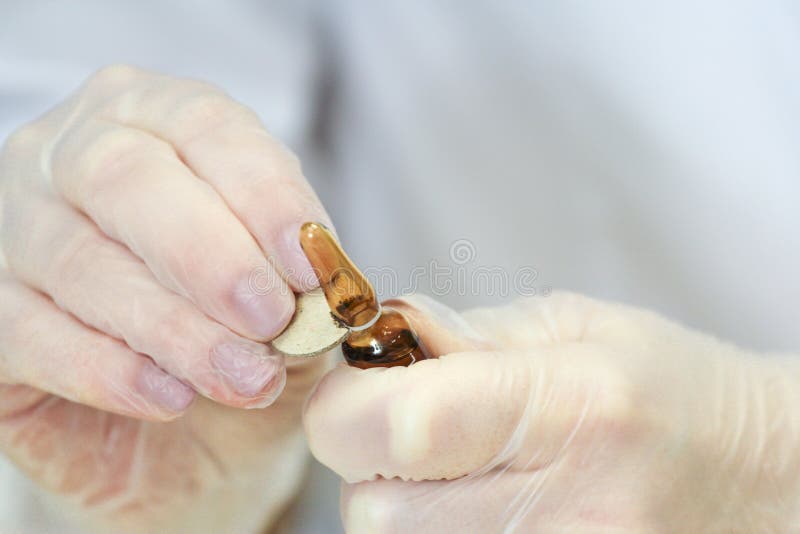 Close Up Ampoule Opening Process Stock Photos Free & RoyaltyFree