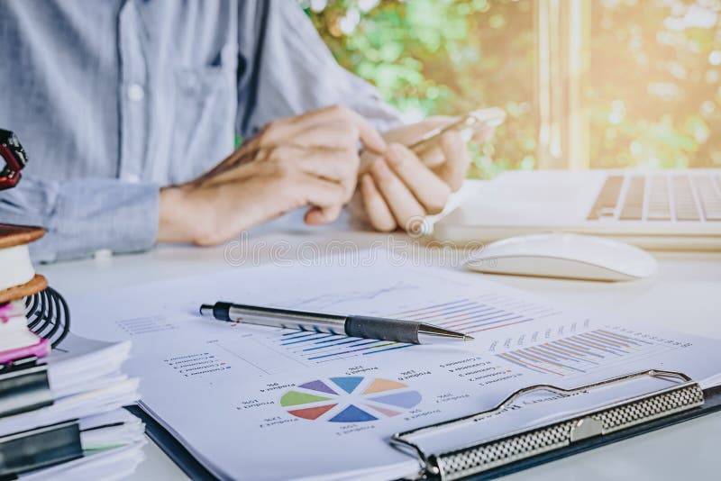 Close Up Analysis Chart or Graph on Modern White Office Desk Stock