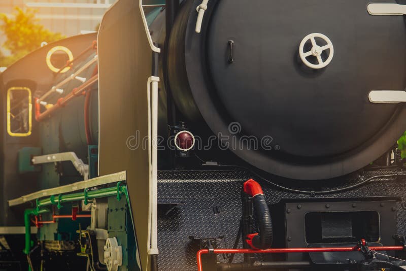 Close up antique vintage train locomotive. Old steam engine locomotive. Black locomotive. History industry. Historic steam train royalty free stock photos Close up antique vintage train locomotive. Old steam engine locomotive. Black locomotive. History industry. Historic steam train royalty free stock photos