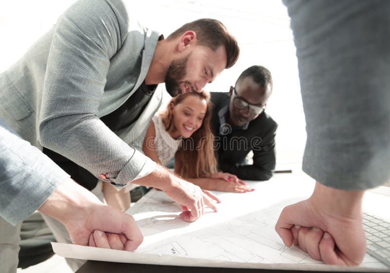 Close up. architect and design team discussing new ideas stock photo