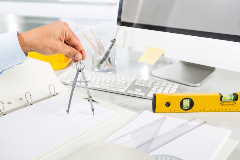Close-up Of Architect Hands Using Metal Drawing Compass royalty free stock photos
