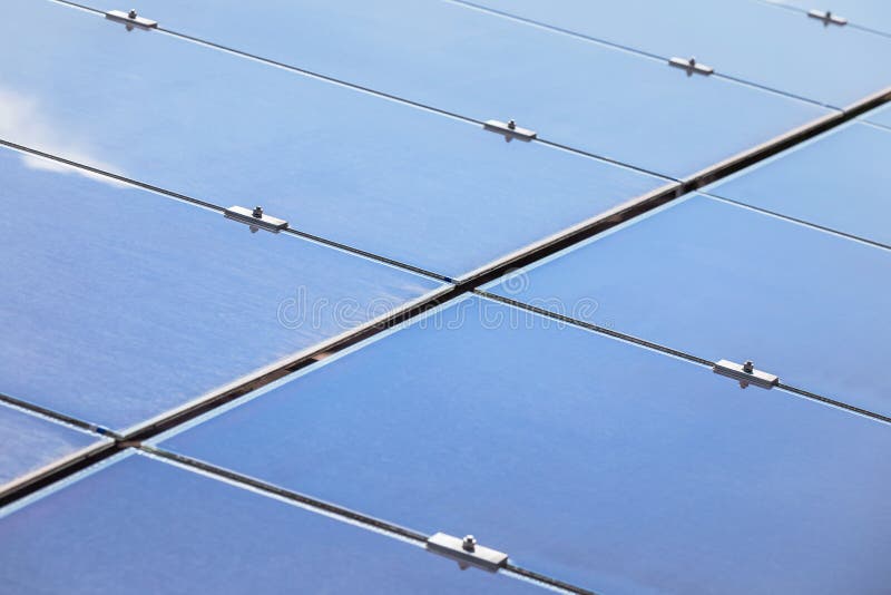 Close up array of thin film solar cells or amorphous silicon solar cells or photovoltaics in solar power plant stock image Close up array of thin film solar cells or amorphous silicon solar cells or photovoltaics in solar power plant stock image