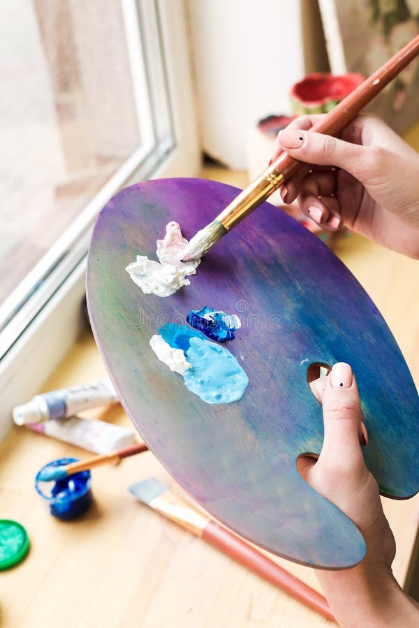 Closeup Artist Mixes Paint Brush on an Easel Stock Photo Image of