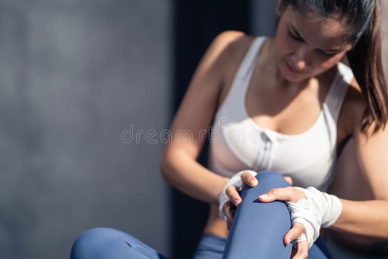 Close up of unrecognized young athlete Asian girl in sportswear