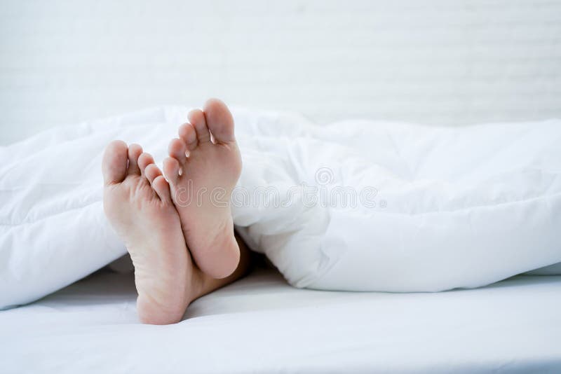 The Foot Of A Sleeping Girl In The Morning Hangs Down The Bed Spy