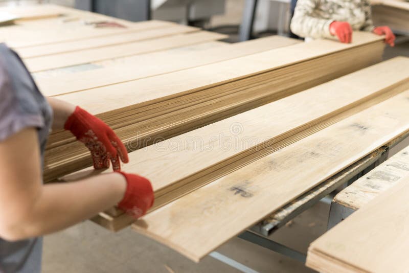 The close up of assembly workflow decorative not chipped wooden blocks. Concept of paneling pattern, seamless background, interior design wall, fine natural texture