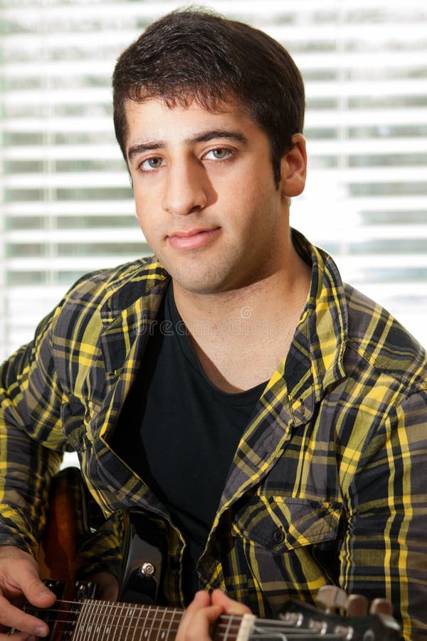 Guitar player closeup royalty free stock images