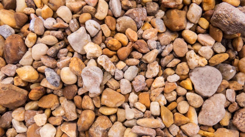 Small stones and pebbles scattered on the ground stock image Small stones and pebbles scattered on the ground stock image