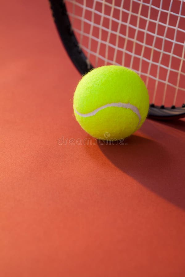Close Up of Ball Against Tennis Racket Stock Photo Image of high
