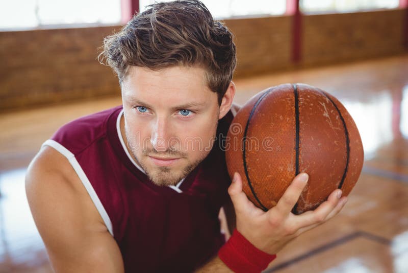 Close Up of Basketball Player Holding Ball Stock Image Image of