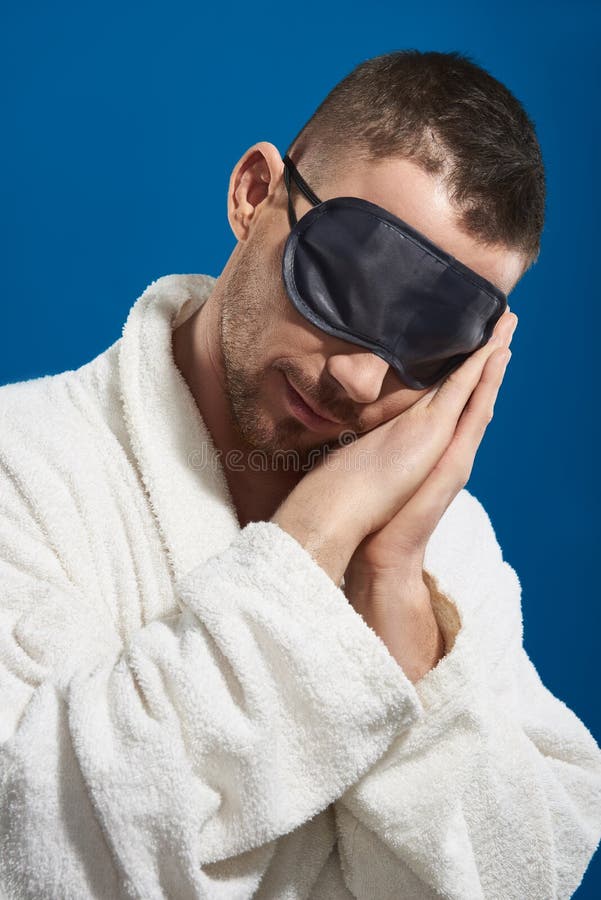 Caucasian Young Man in Night Eye Patches Sleeping Against Blue Background Stock Image Image of