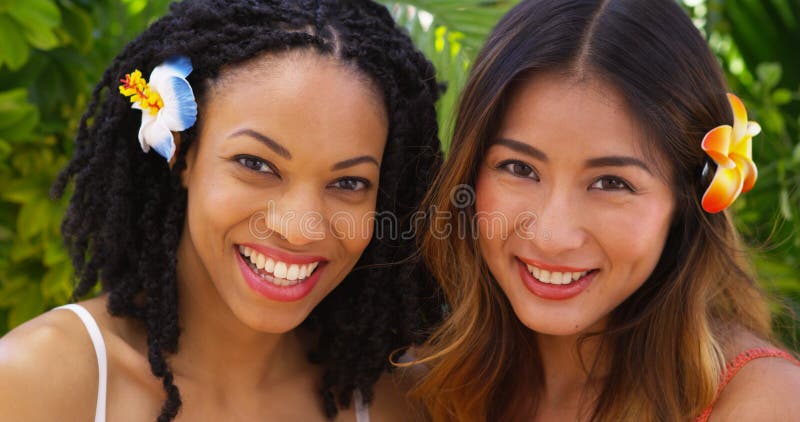 Close up of Beautiful African American and Asian women on vacation together stock photos Close up of Beautiful African American and Asian women on vacation together stock photos