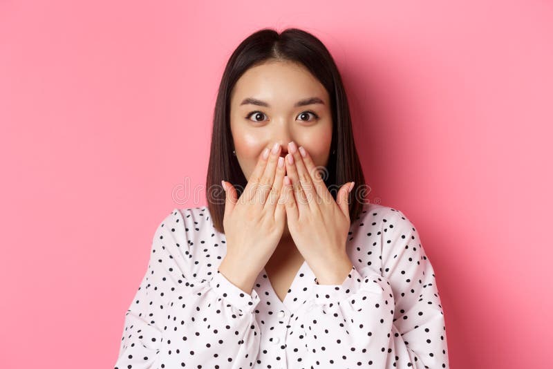 Close Up Of Beautiful Asian Girl Looking Surprised And Excited Cover