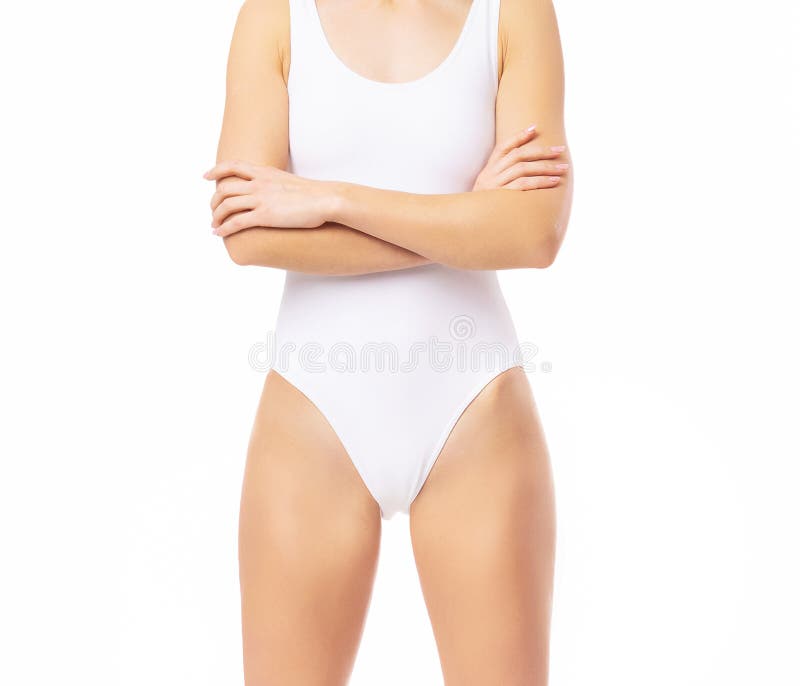 Close-up of a beautiful and fit female figure. Studio photo of young woman& x27;s body in swimsuit.