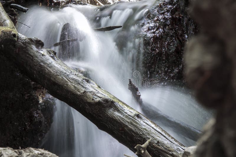 Close up of a beautiful waterfall in the mountains in Slovakia f