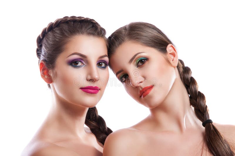 Close Up Beauty Portrait Of Two Beautiful Young Women Stock Image