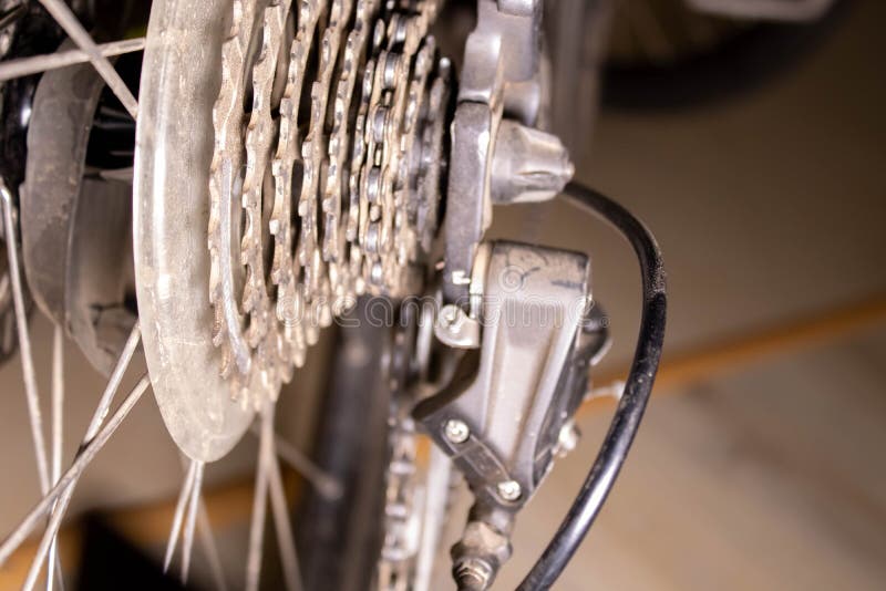 Closeup Bicycle Wheel and Bicycle Plate on Marble Floor Stock Image