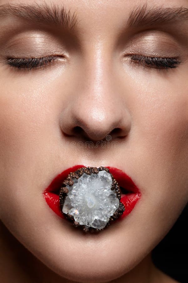 Close Up of Bijouterie Ring with Stone in Red Female Mouth Lips Stock